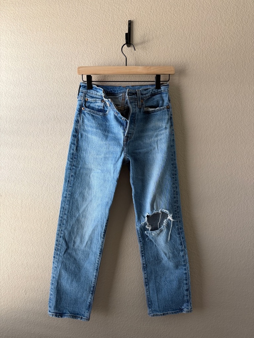 Levi's Light Blue Distressed Straight Leg Jeans with Knee Rip